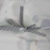 Слюнявчик з рукавами Kruzzel 22255 (5900779944640)